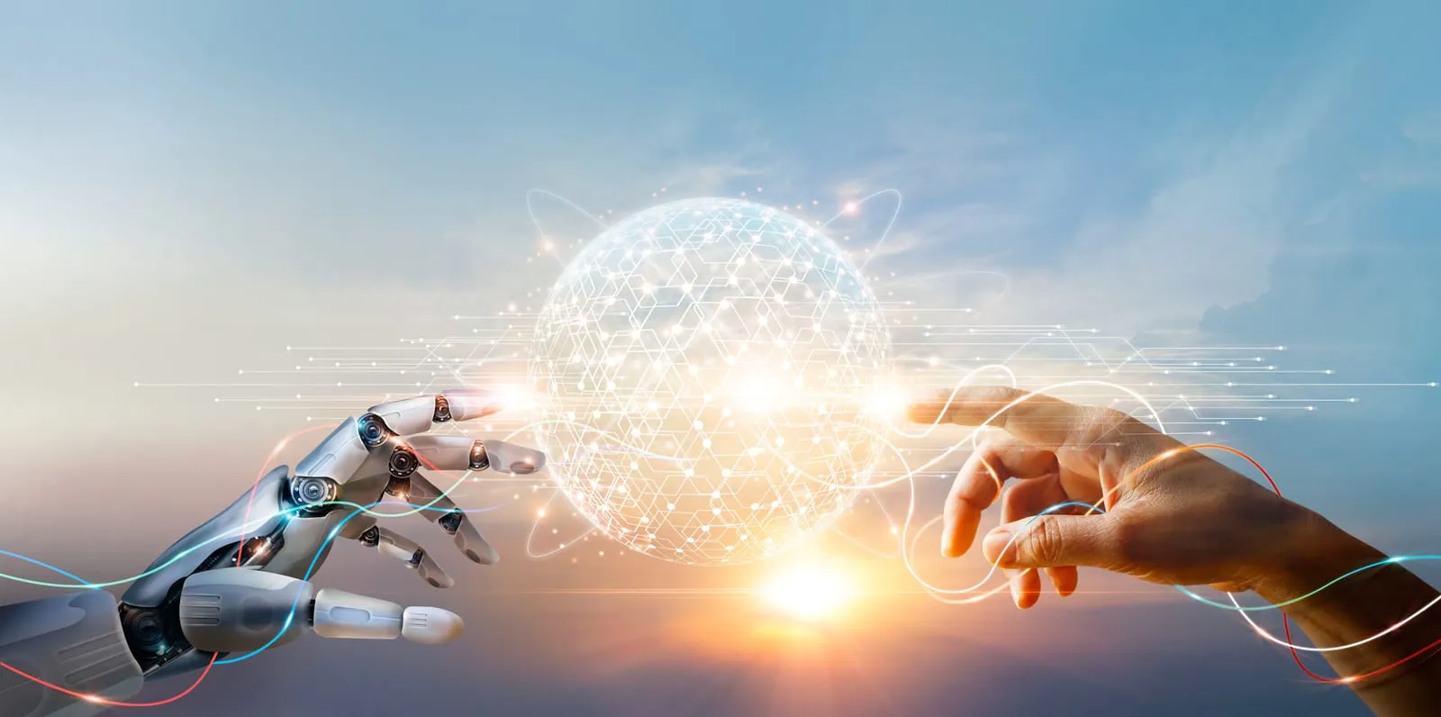 Una mano robotica e una mano umana che sfiorano una sfera luminosa di connessioni digitali